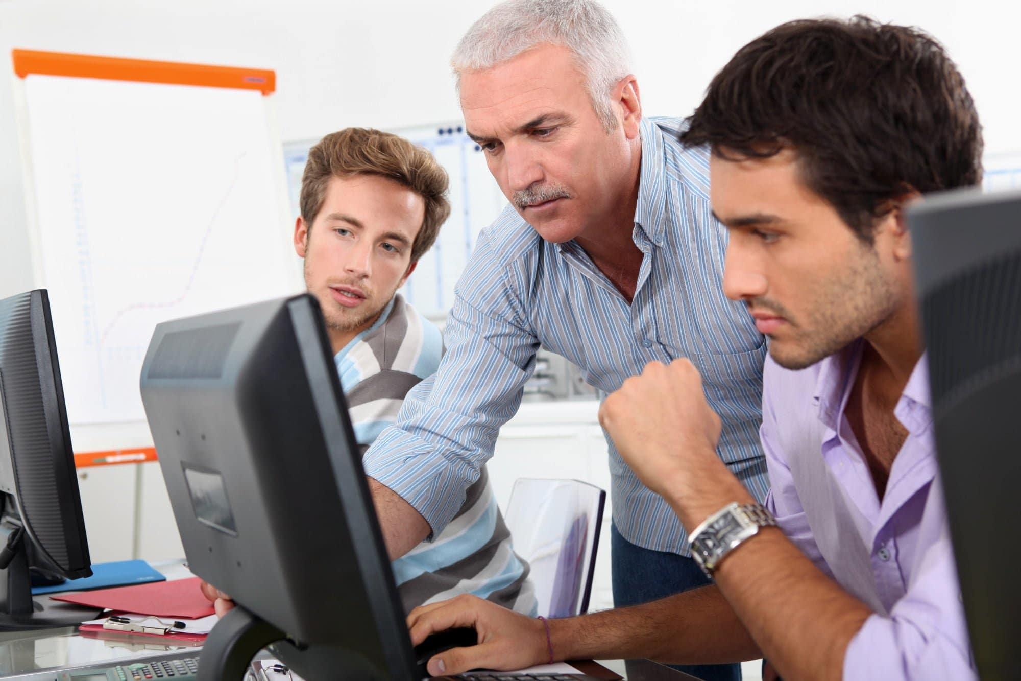it consultant looking at computer